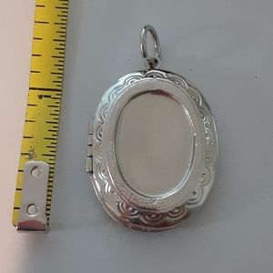 Silvertone locket